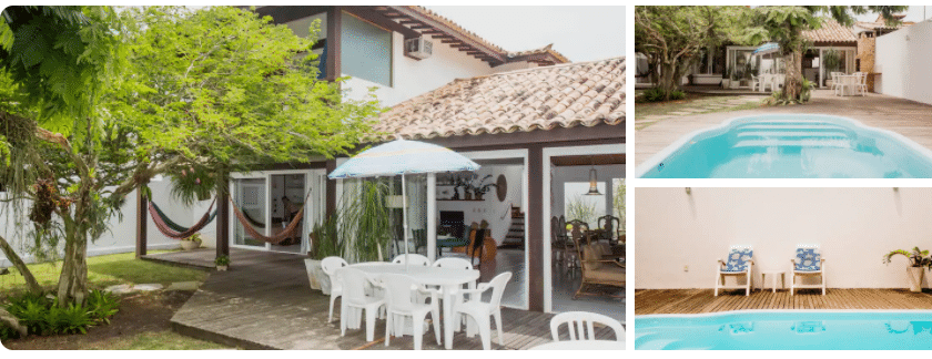 Varanda com mesa e cadeira e rede e piscina de Casa com piscina para alugar em Búzios